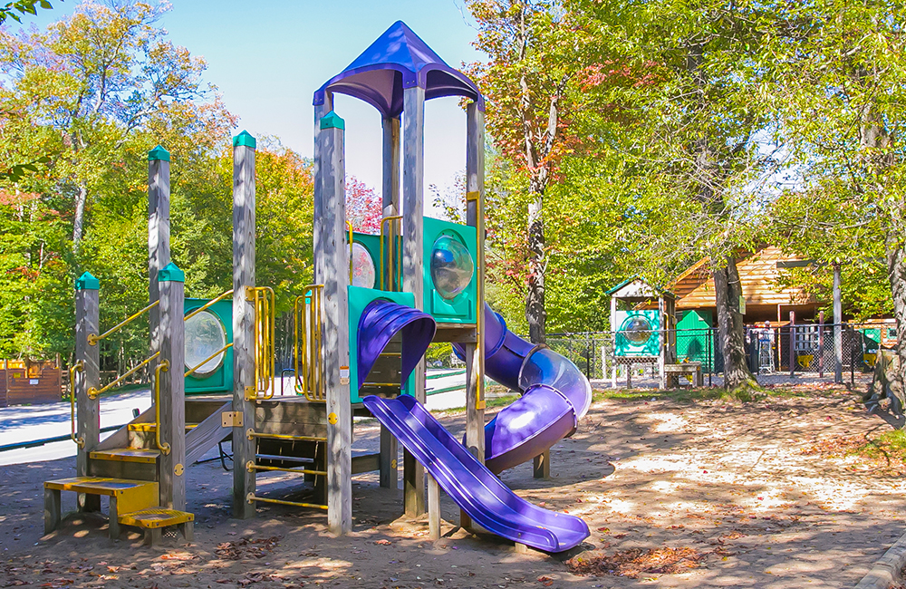 One of the playgrounds at Old Forge Camping Resort. There are slides and areas for the kids to climb.